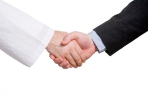 Business and medicine handshake